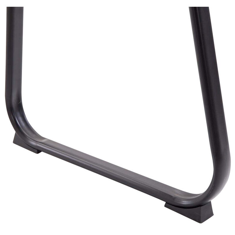 Polstret besøgsstol med buet sort metalramme og kunstlæder