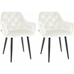 Elegant fløjlsbelagt spisestol med høj ryg og metalramme til moderne indretning