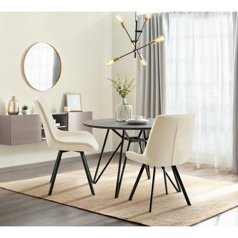 Elegant fløjlsbeklædt spisestol med drejelig sæde og metalramme