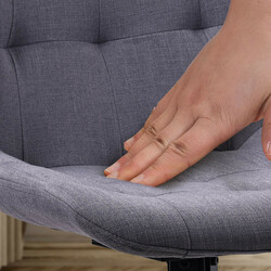 Elegant drejelig spisestol med polstret sæde rygstøtte og sort metalramme