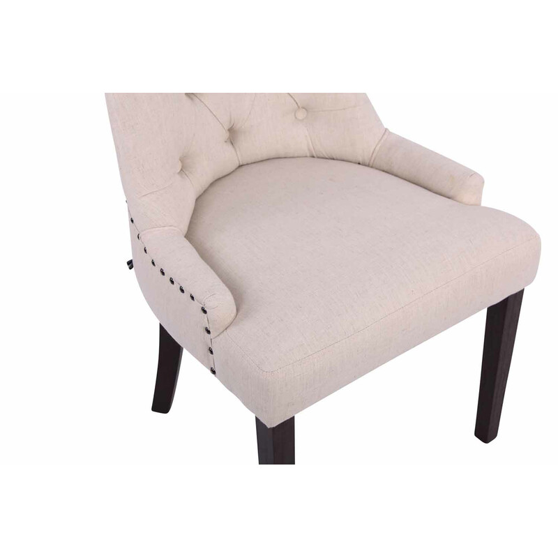 Elegant polstret spisestol med stof og dekorative syninger og fire gummitræben