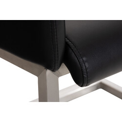 Magnus visitstol med kunstlæder og svingende rustfri stålramme