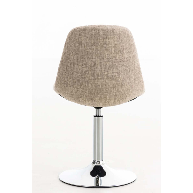 Roterende spisebordstol med polstret stofsæde kromramme og trompetben