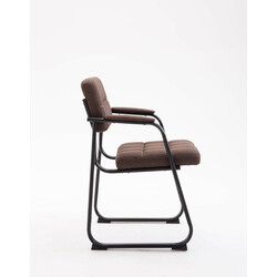 Elegant polstret besøgsstol med sort metalfod og tuftet sædebetræk