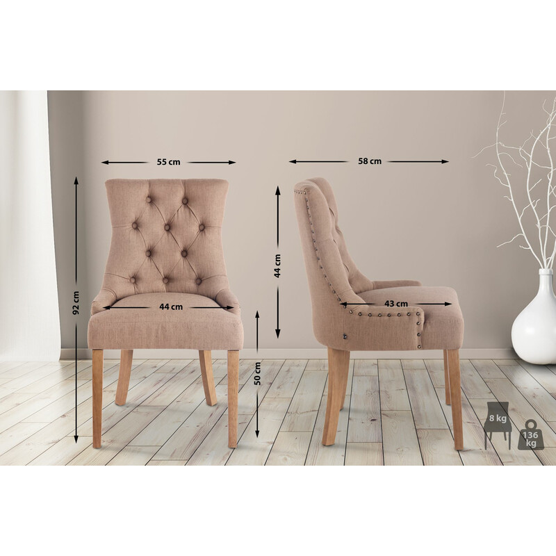 Elegant polstret spisestol med stof og stabilt træben