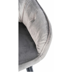 Elegant polstret spisestol med armlæn og metalstel