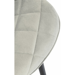 Sammetstol med firebenet metalramme til moderne hjem